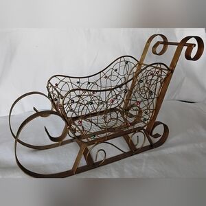 Decorative Gold Colored Metal Sleigh with Beaded Accents